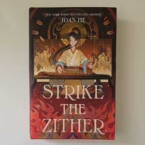 Strike the Zither Book by Joan He